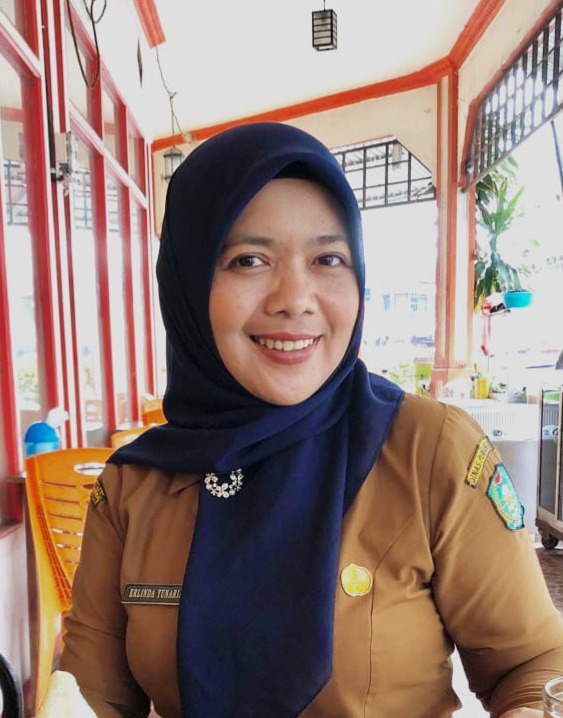Erlinda Yunaria, SP.